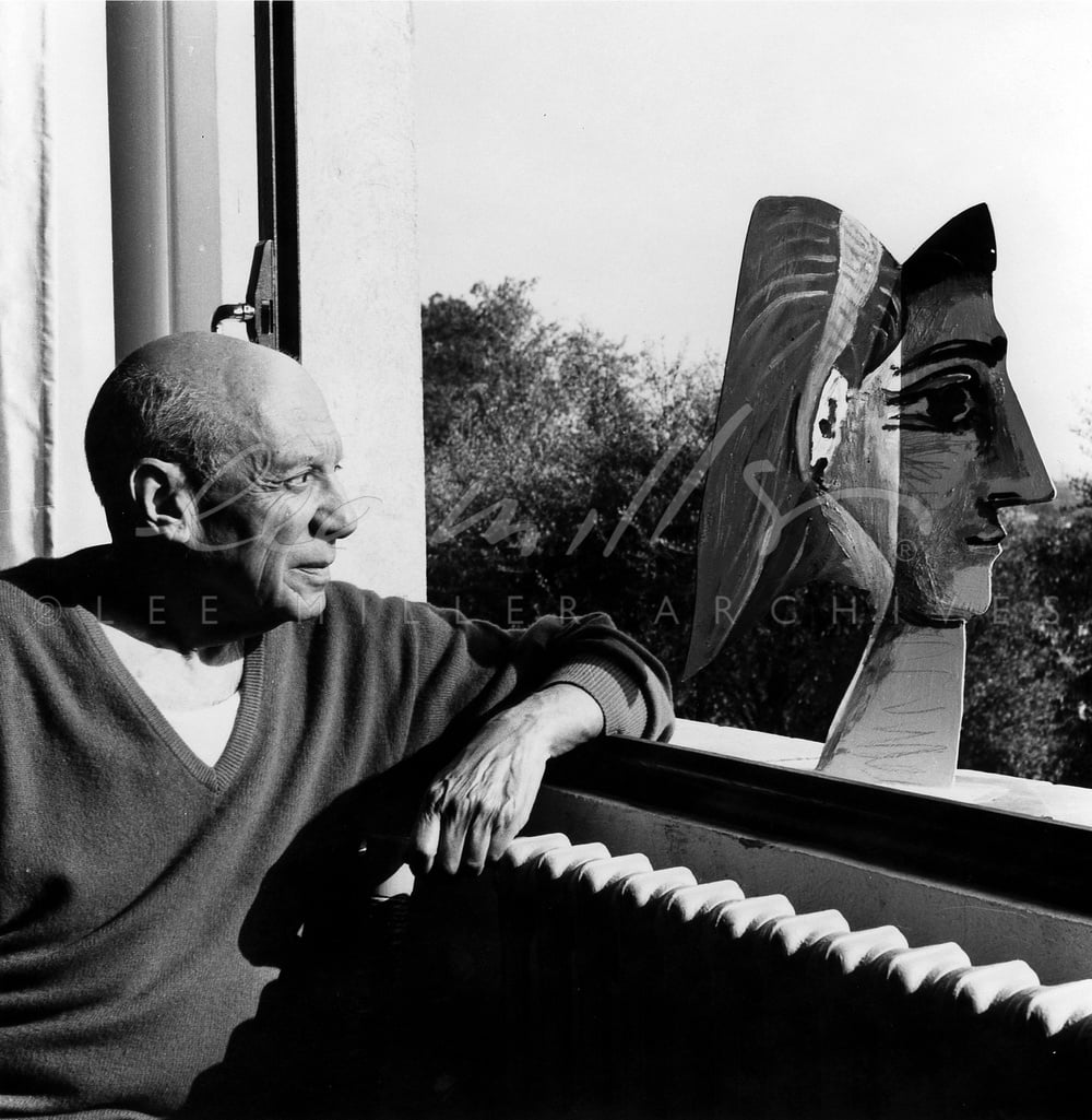 Picasso with metal sculpture of Jacqueline Roque